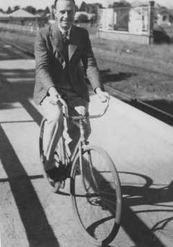 Cecil Norman on bicycle